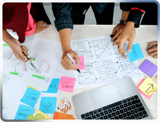 Development team reviewing an agile delivery board